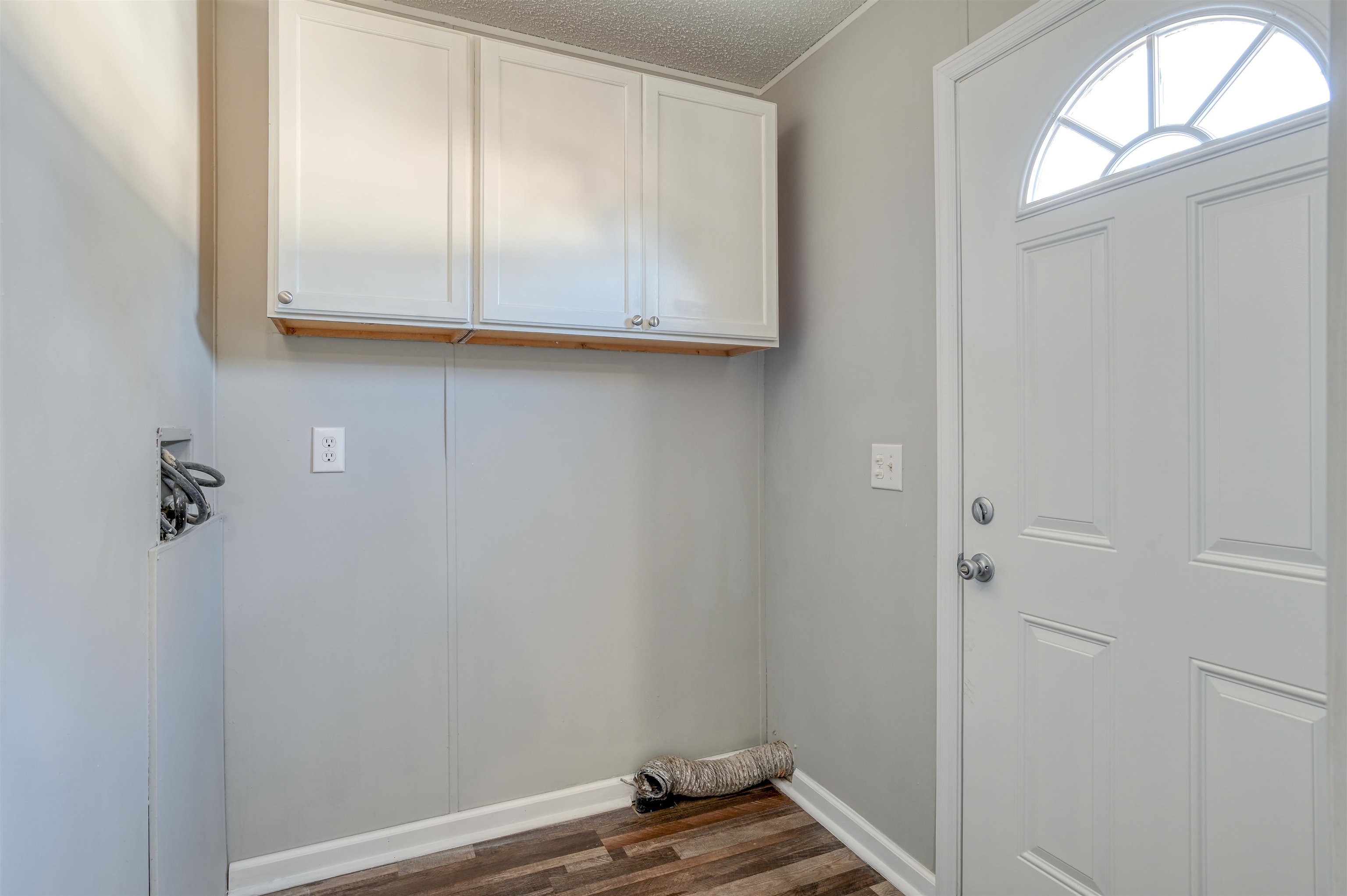 4661 Second Avenue St. Augustine, FL 32095 - Photo 22 of 26 a view of a small space with wooden floor and a window