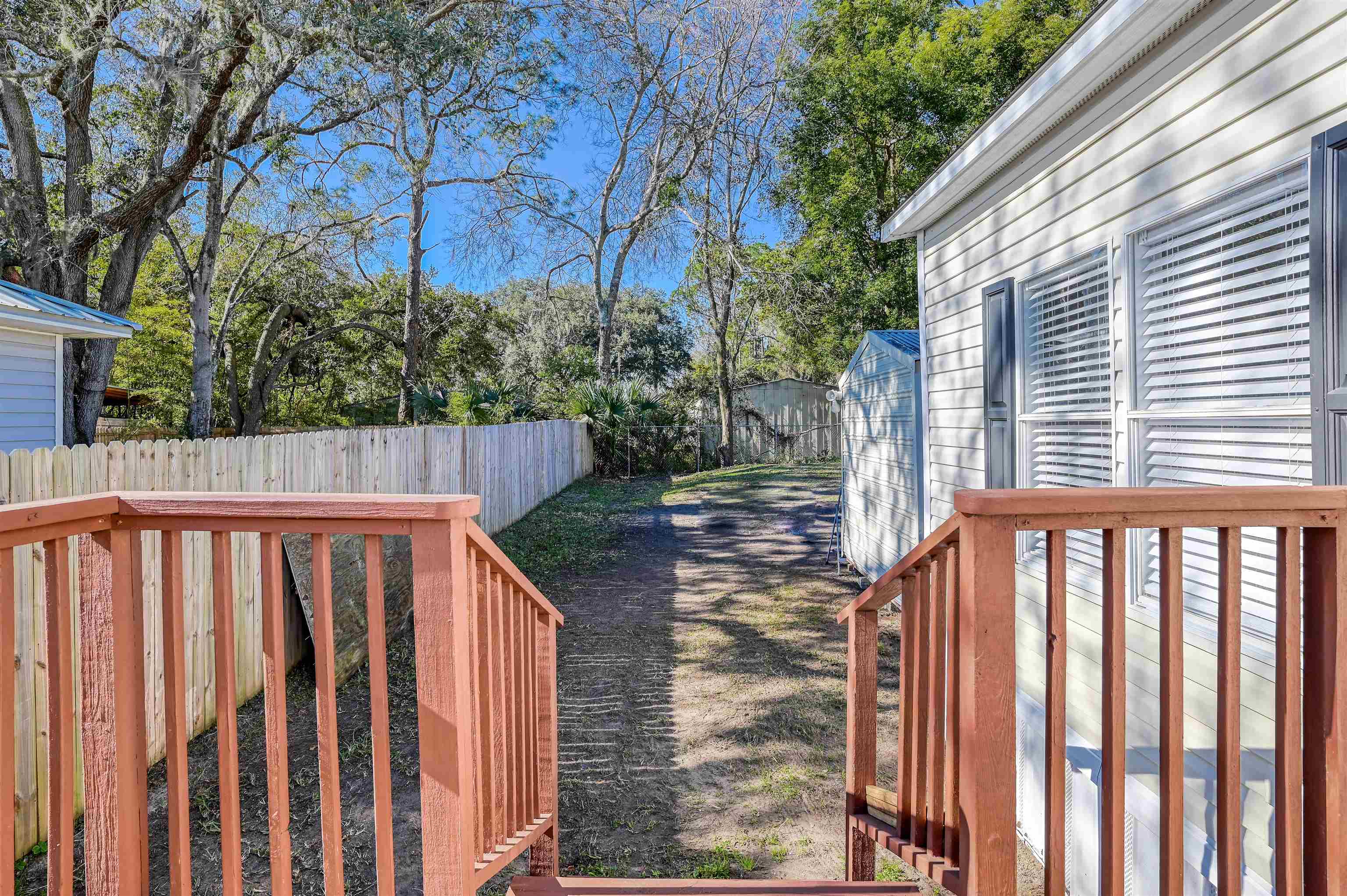 4661 Second Avenue St. Augustine, FL 32095 - Photo 23 of 26 a view of a wooden fence