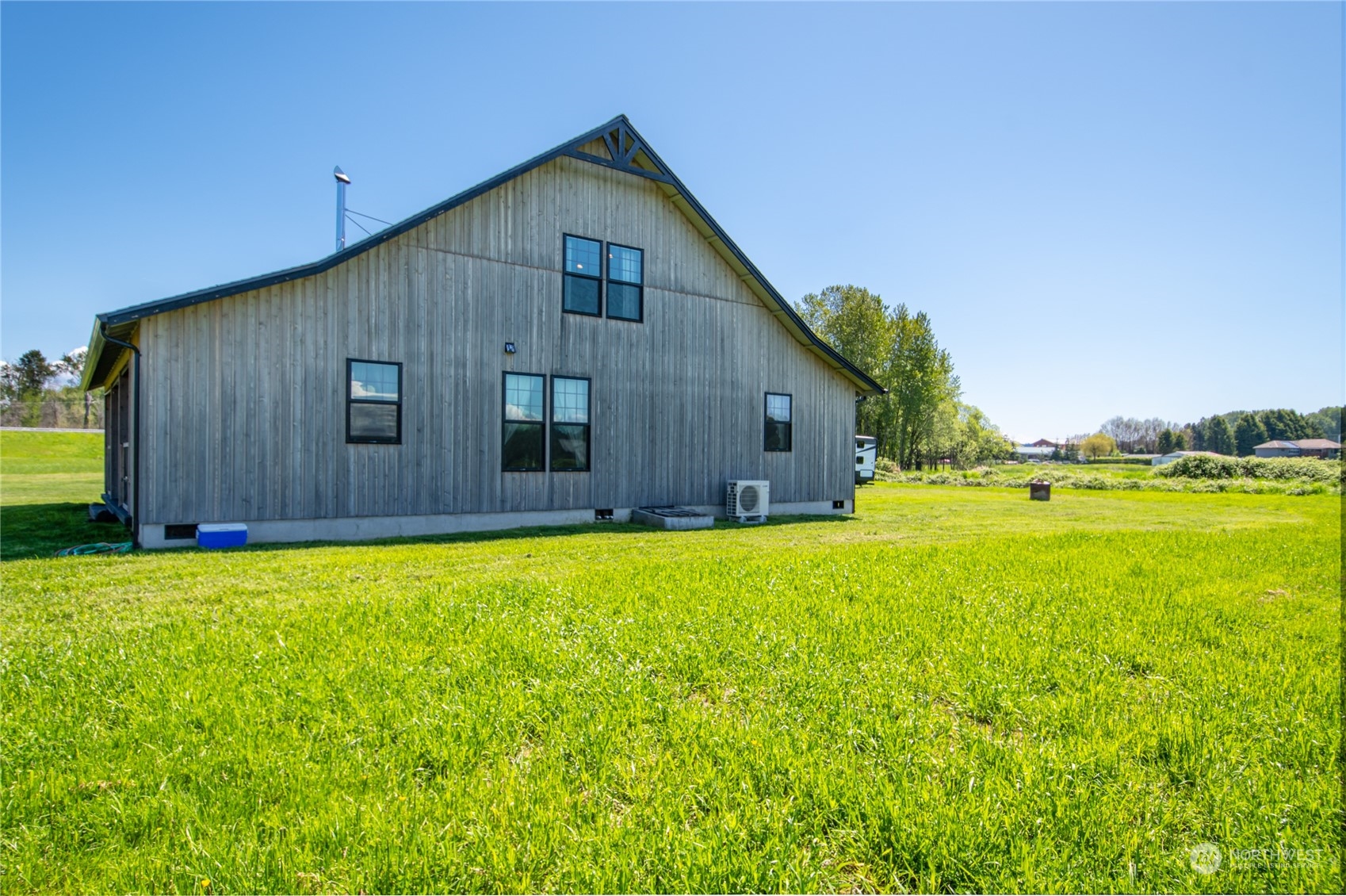 9333 Willow Grove Road Longview, WA 98632 - Photo 37 of 40 a view of a house with backyard and garden