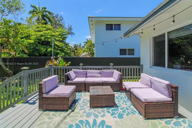 a outdoor living room with furniture