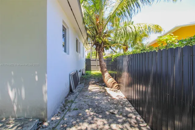 a view of a hallway with stairs