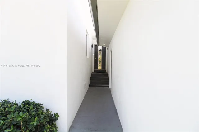 a view of a backyard with a small cabin