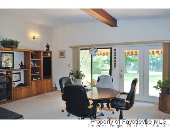 7371 Sherrill Baggett Road Dunn, NC 28334 - Photo 10 of 25 a dining room with furniture window and outside view