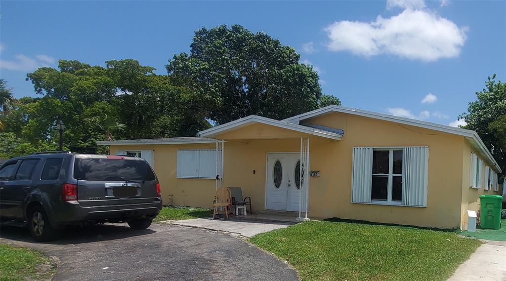 a view of a car in front of a house