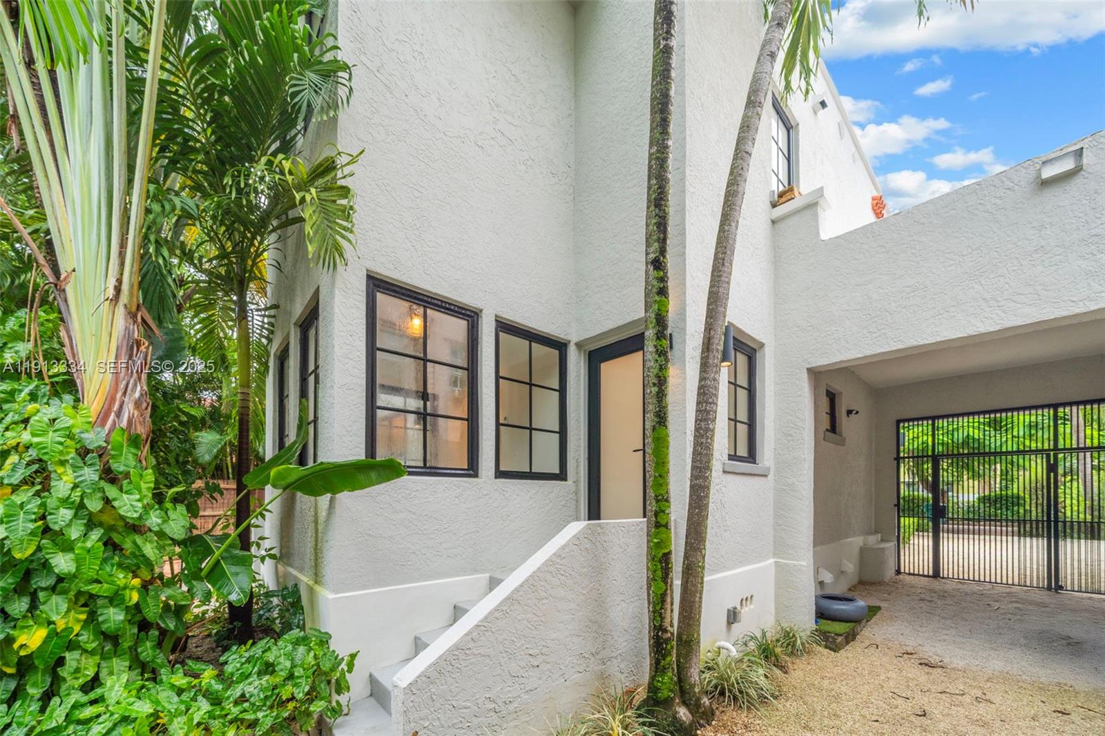 151 Northeast 43rd Street Miami, FL 33137 - Photo 3 of 51 a view of entrance front of house