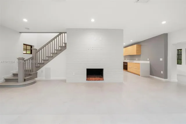 a view of a livingroom with a fireplace