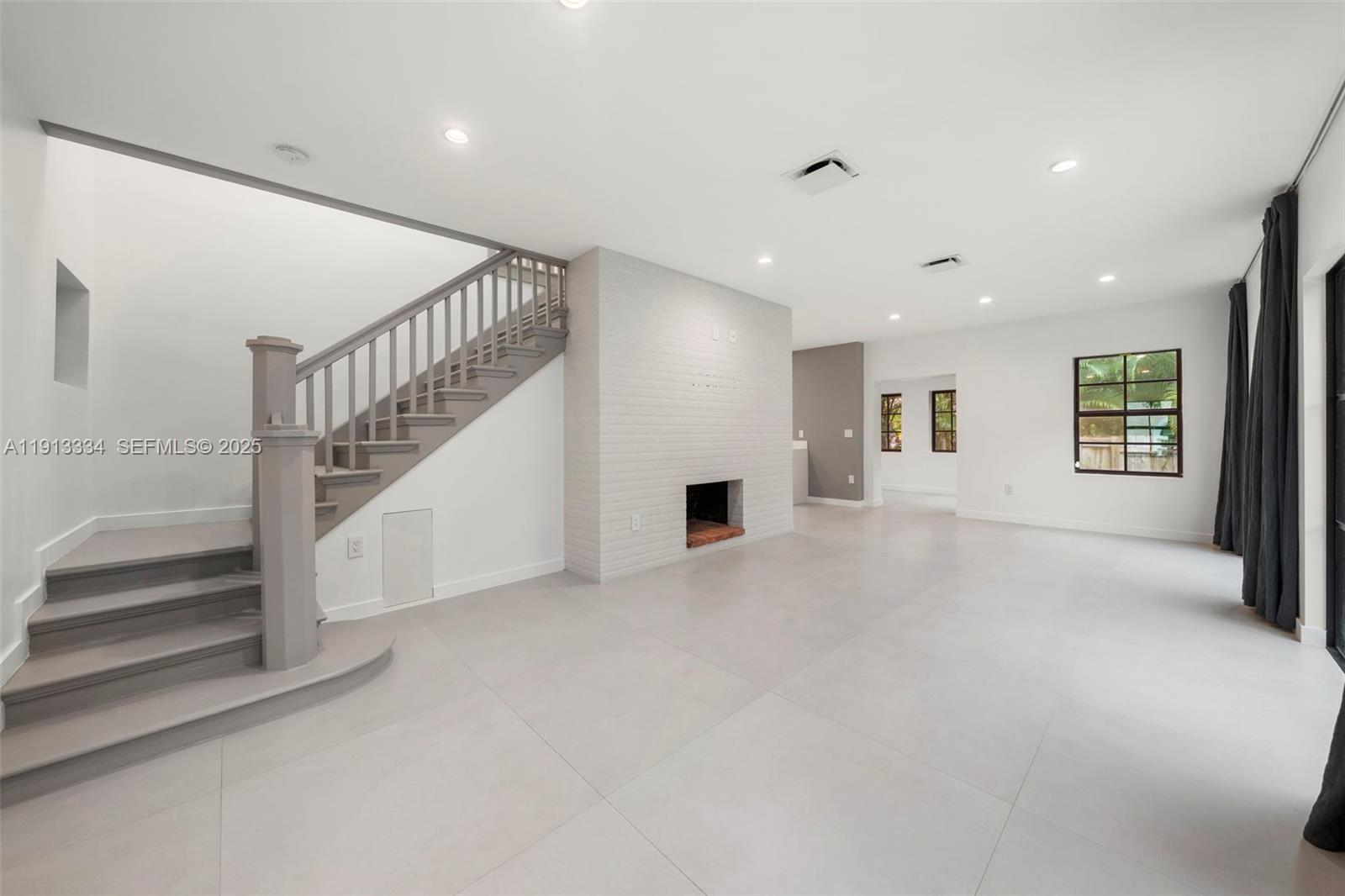 151 Northeast 43rd Street Miami, FL 33137 - Photo 41 of 51 a view of an entryway with stairs