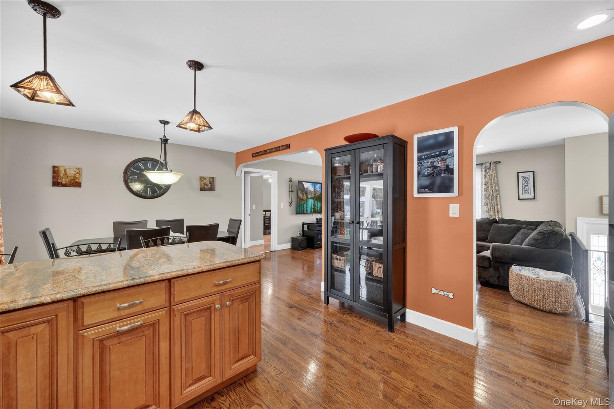 4 Adams Drive Stony Point, NY 10980 - Photo 12 of 41 a kitchen with stainless steel appliances granite countertop a sink and dishwasher with wooden floor