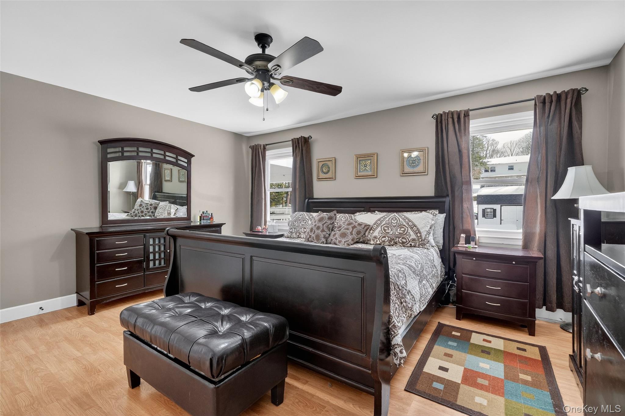 4 Adams Drive Stony Point, NY 10980 - Photo 19 of 41 a bedroom with a bed and a chandelier