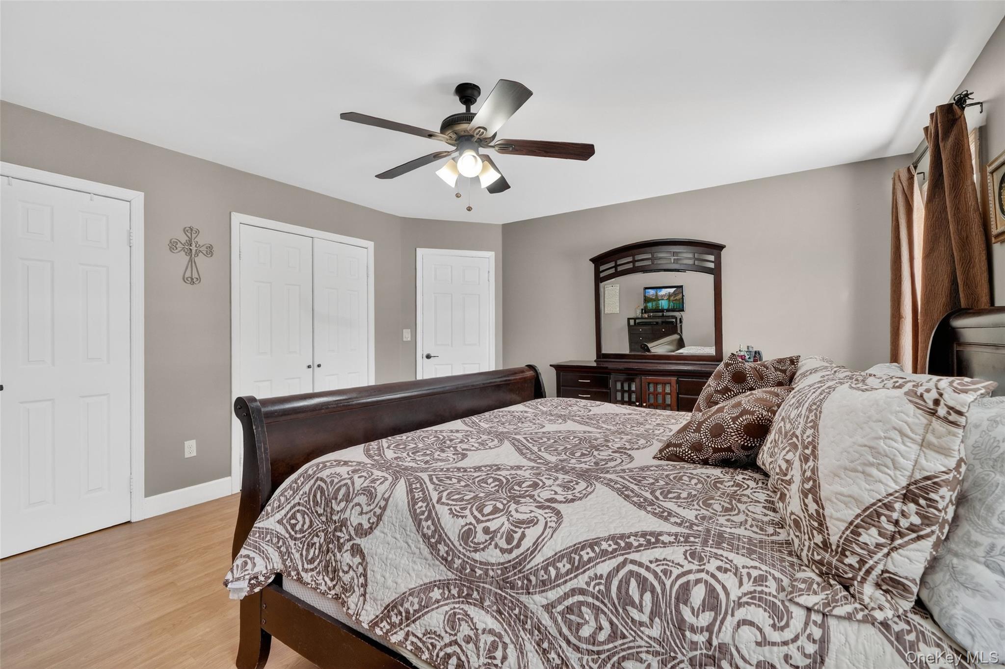 4 Adams Drive Stony Point, NY 10980 - Photo 20 of 41 a large bedroom with a bed and wooden floor