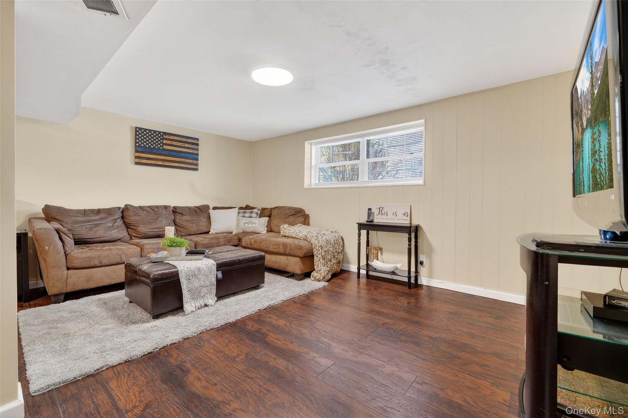 4 Adams Drive Stony Point, NY 10980 - Photo 25 of 41 a living room with furniture and a wooden floor
