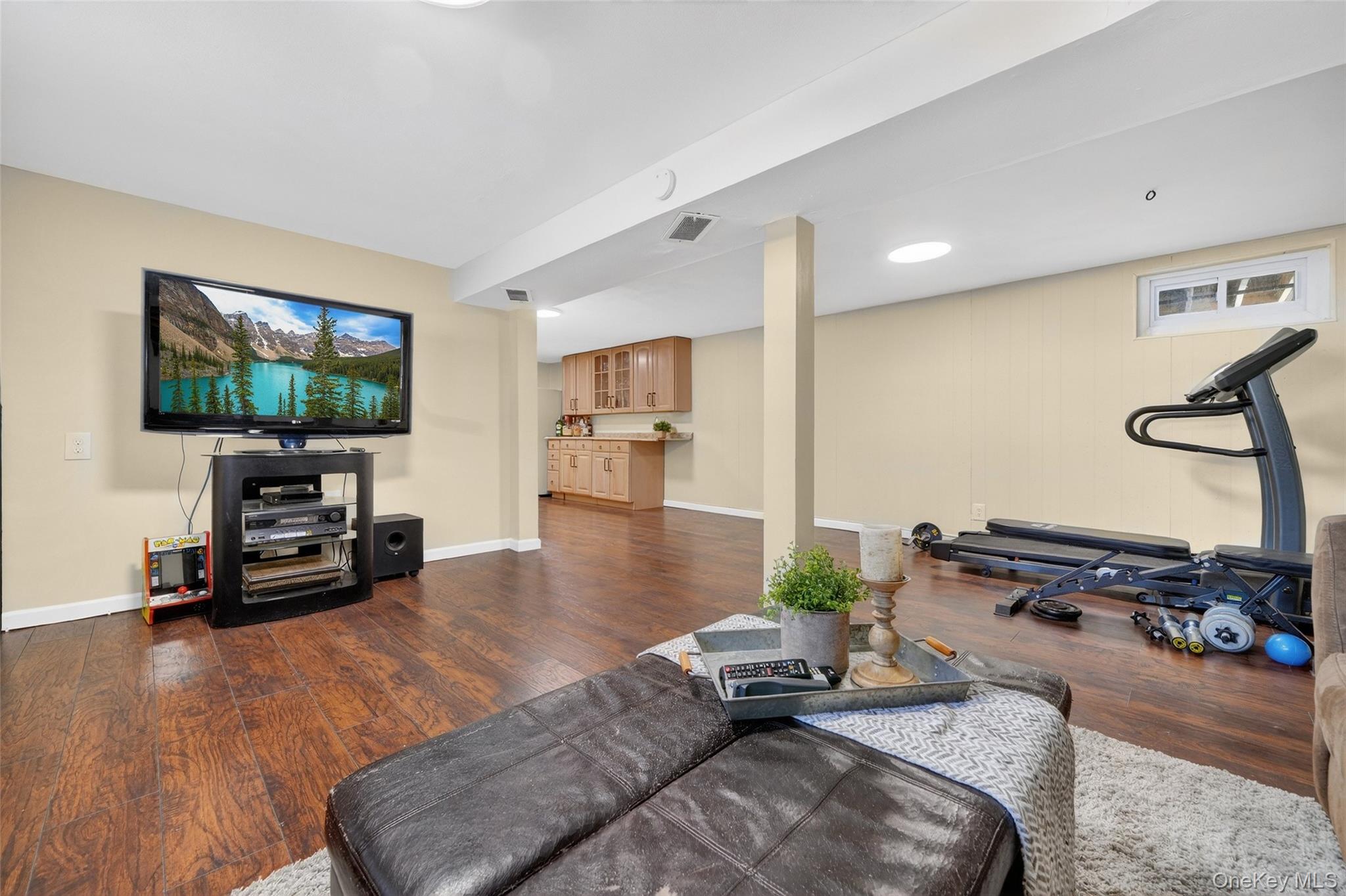 4 Adams Drive Stony Point, NY 10980 - Photo 28 of 41 a living room with furniture and a flat screen tv