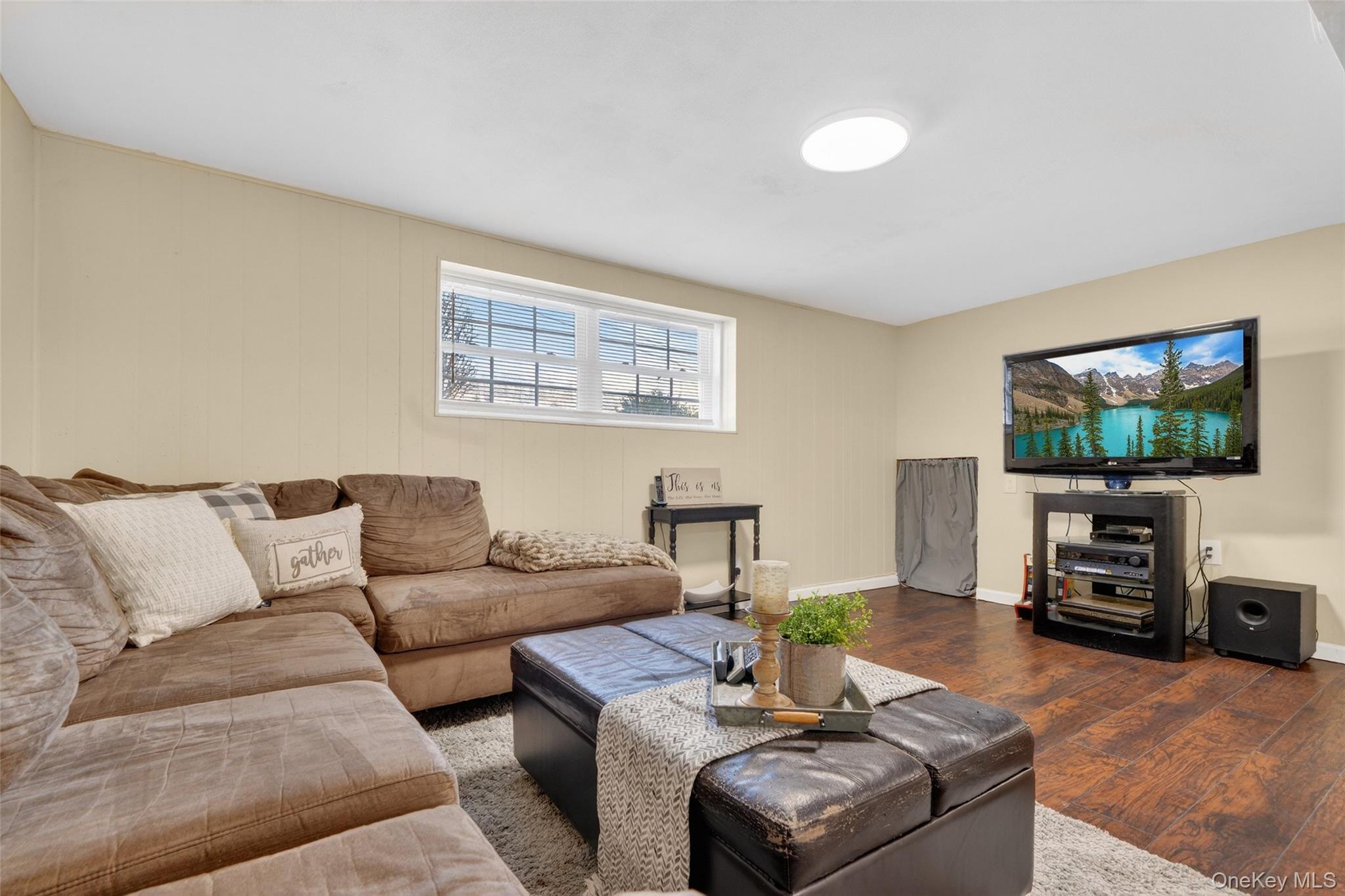 4 Adams Drive Stony Point, NY 10980 - Photo 29 of 41 a living room with furniture and a flat screen tv