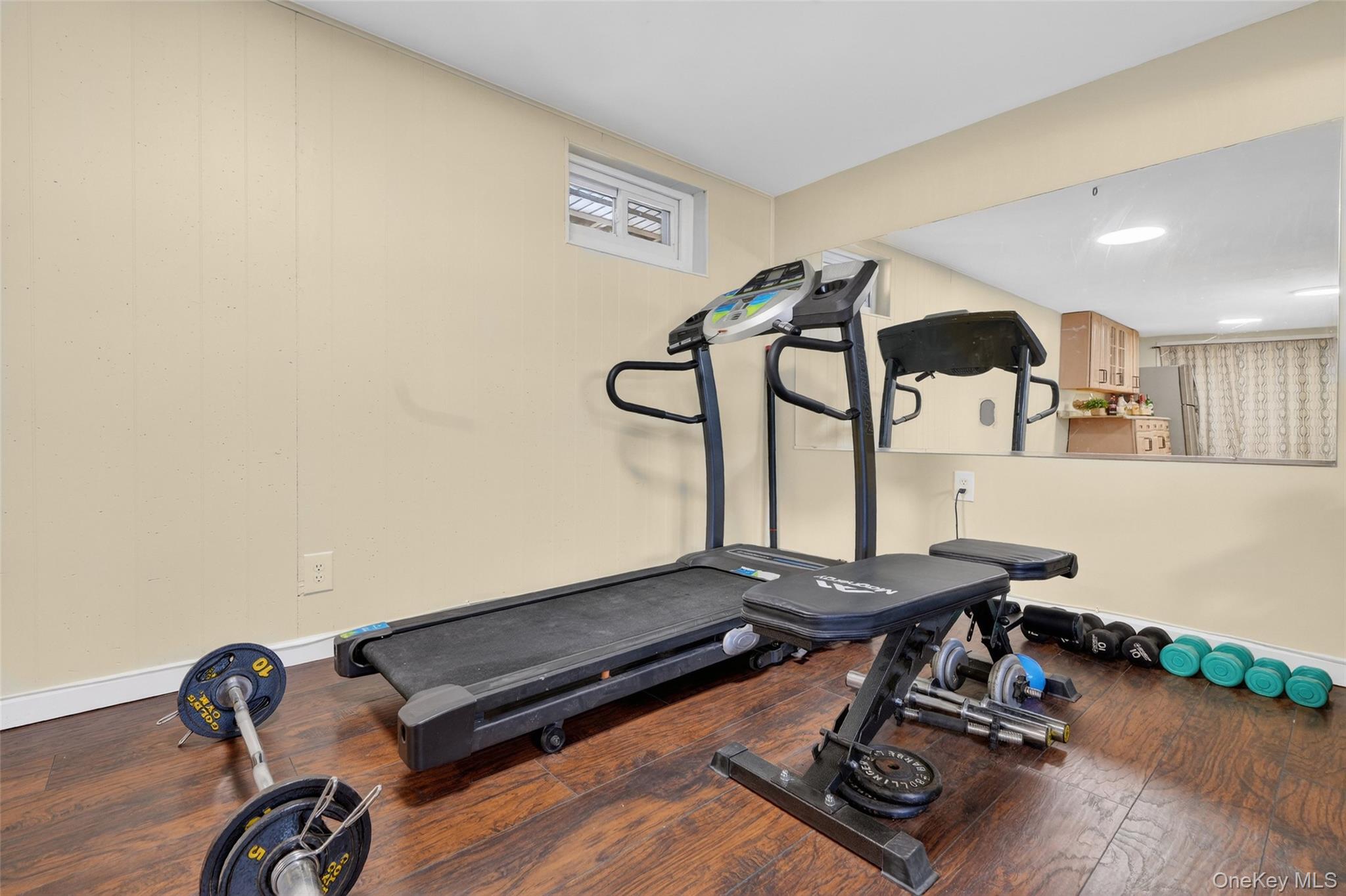 4 Adams Drive Stony Point, NY 10980 - Photo 30 of 41 a room with gym equipment and wooden floor