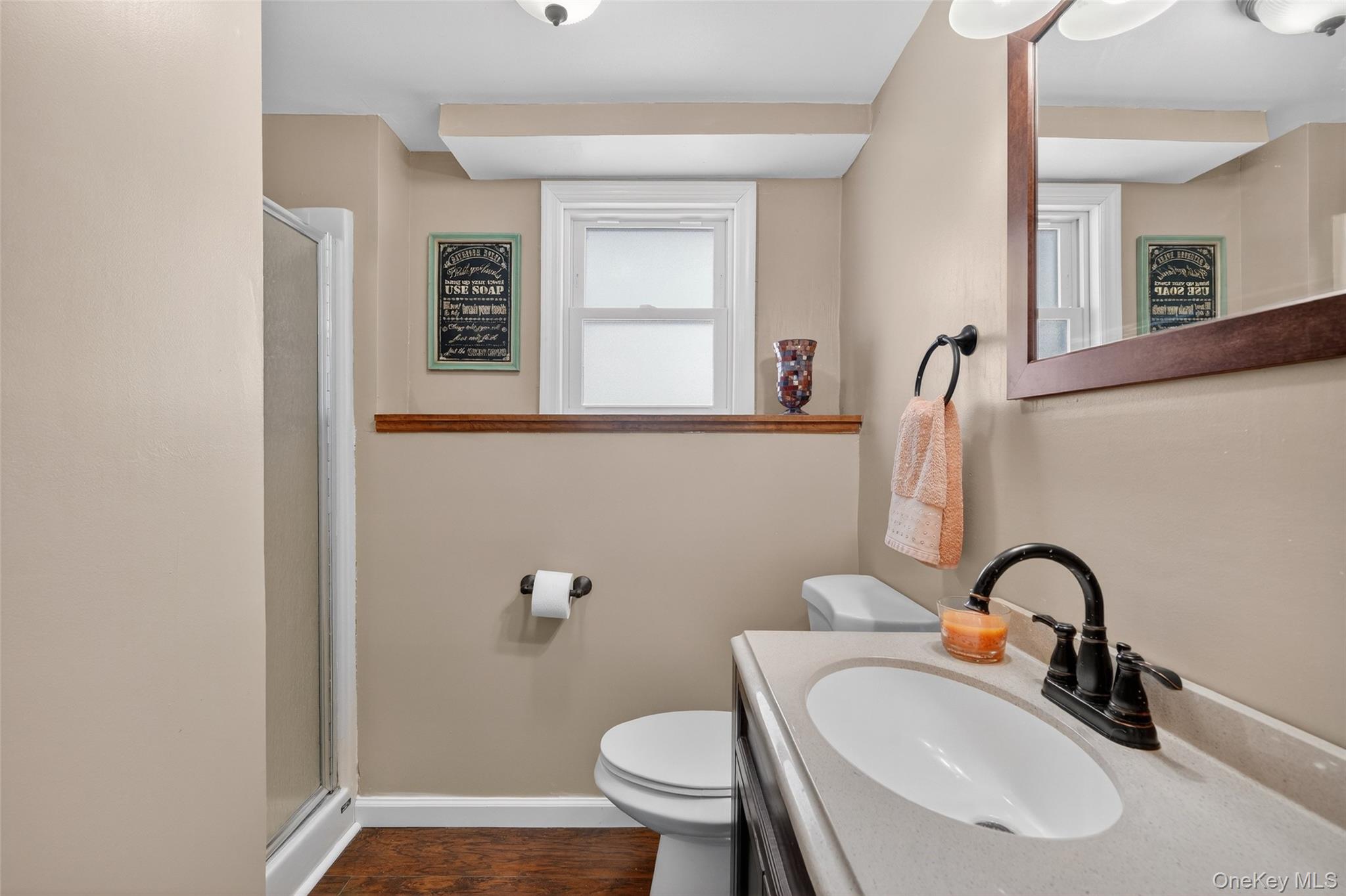 4 Adams Drive Stony Point, NY 10980 - Photo 32 of 41 a bathroom with a sink a toilet and mirror