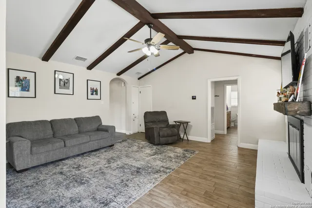 a living room with furniture and a couch