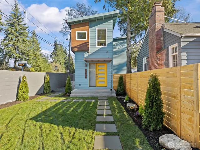 front view of a house with a yard