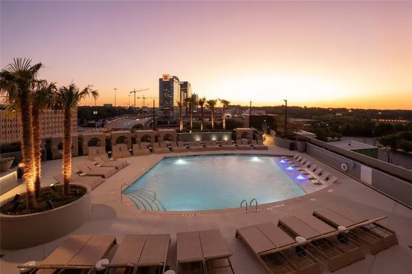 a view of a swimming pool with a terrace