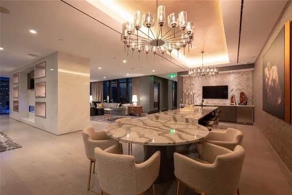 a view of a dining room with furniture