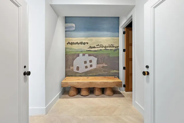 a room with a table and a toilet