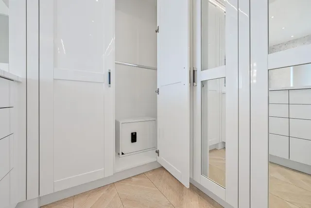 an empty room with cabinet