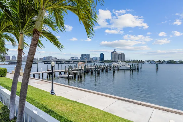 a room with lots of wooden furniture and a table
