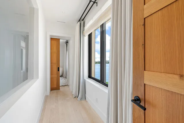 a view of a bathroom with a glass door