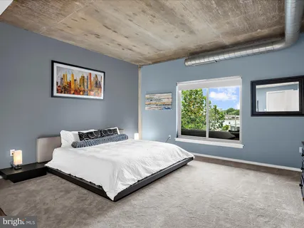 a bathroom with a sink toilet and mirror