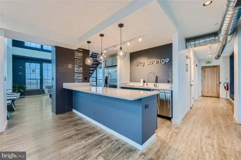 a view of a dinning table and chairs in the patio