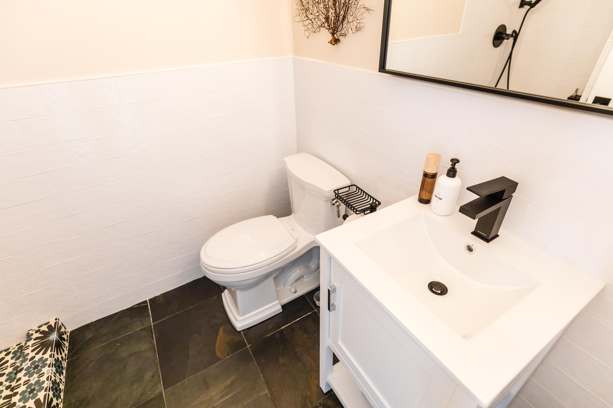 5455 8th Street, Unit 96 Carpinteria, CA 93013 - Photo 14 of 28 a white toilet sitting next to a white sink