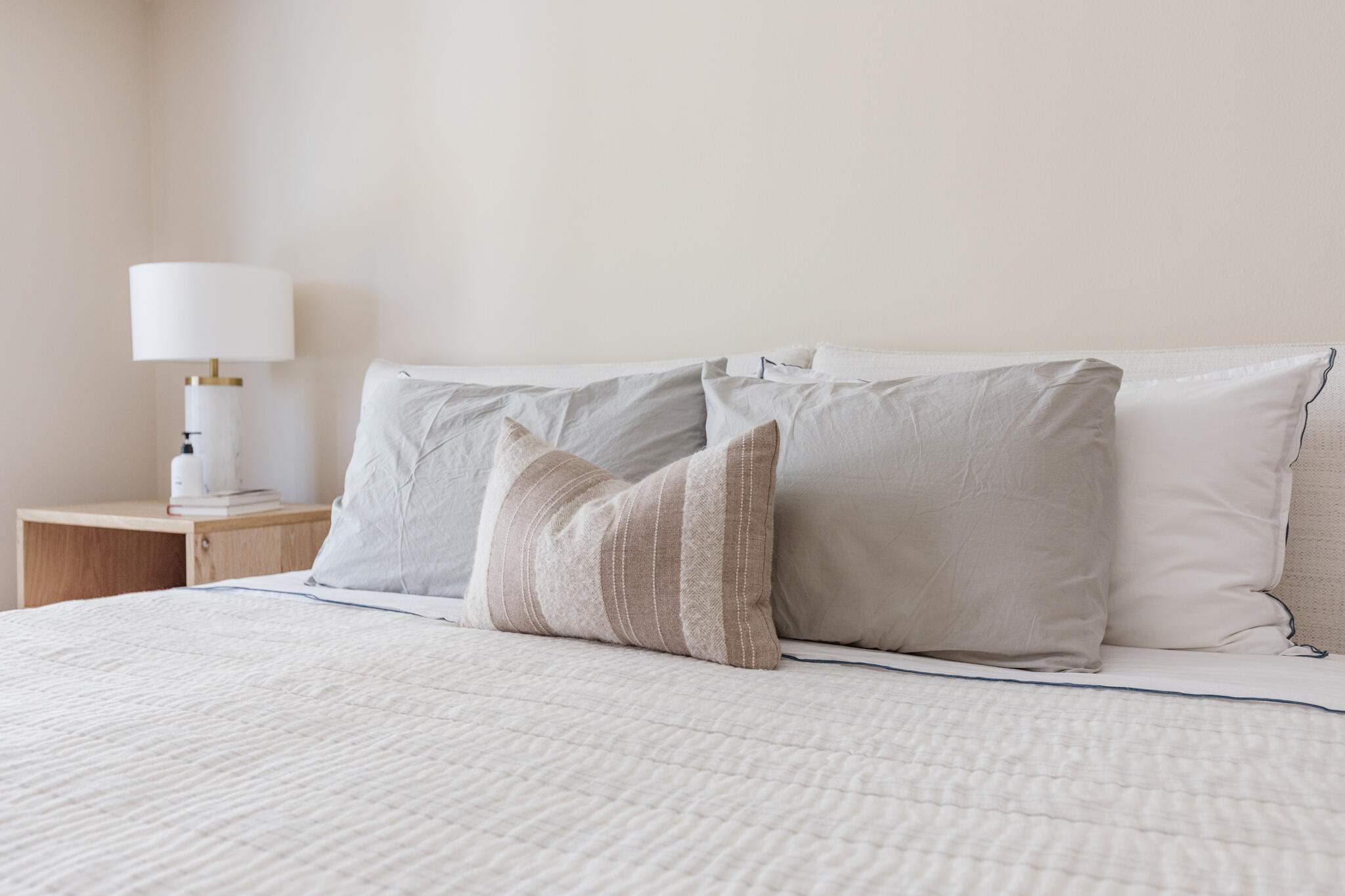 5455 8th Street, Unit 96 Carpinteria, CA 93013 - Photo 16 of 28 a bedroom with a bed and a night stand