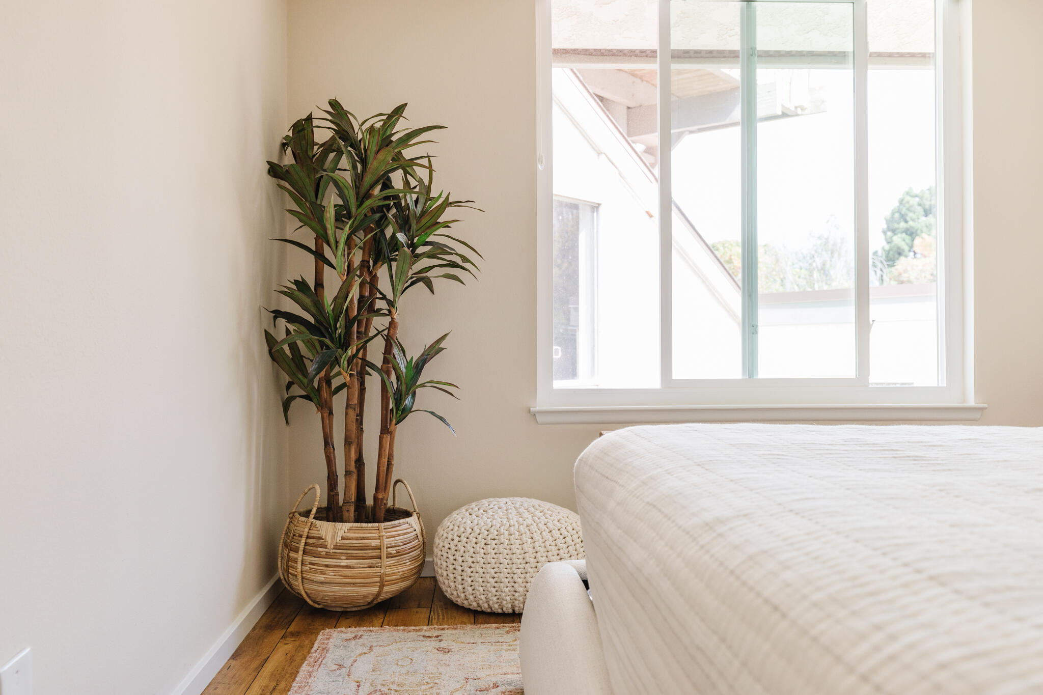 5455 8th Street, Unit 96 Carpinteria, CA 93013 - Photo 19 of 28 a bedroom with a bed and a potted plant