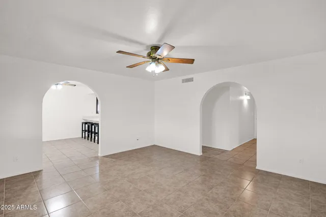 a view of an empty room and window