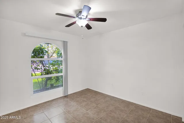 a bathroom with a sink mirror vanity and toilet