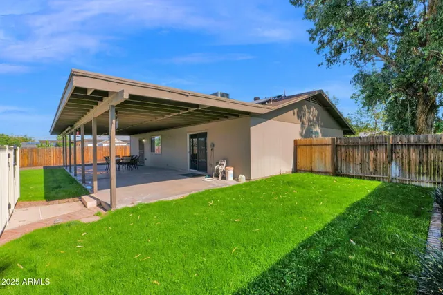 a view of a swimming pool with a garden