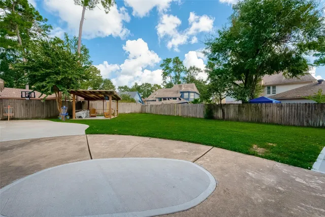 a view of a house with a small yard