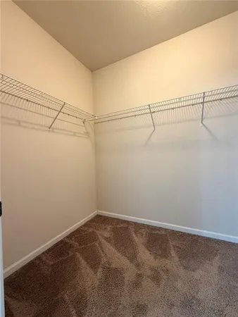 a view of a bathroom with a glass door