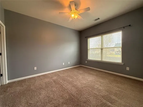 a view of balcony with wooden floor