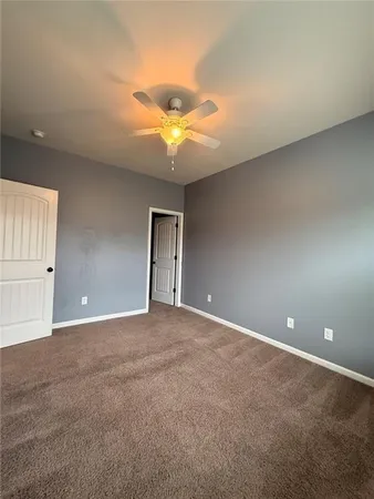 a view of balcony with wooden floor