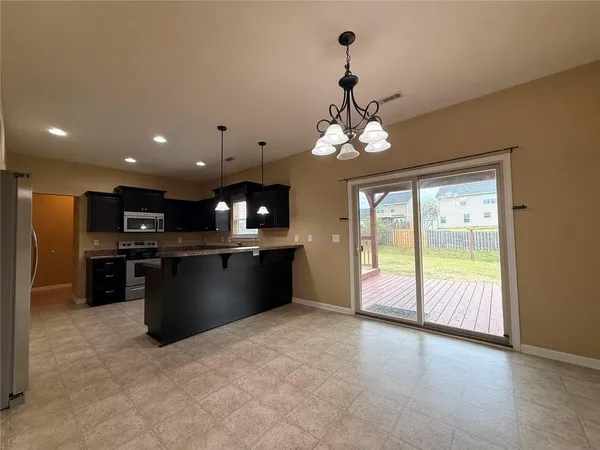 a view of a kitchen with a sink