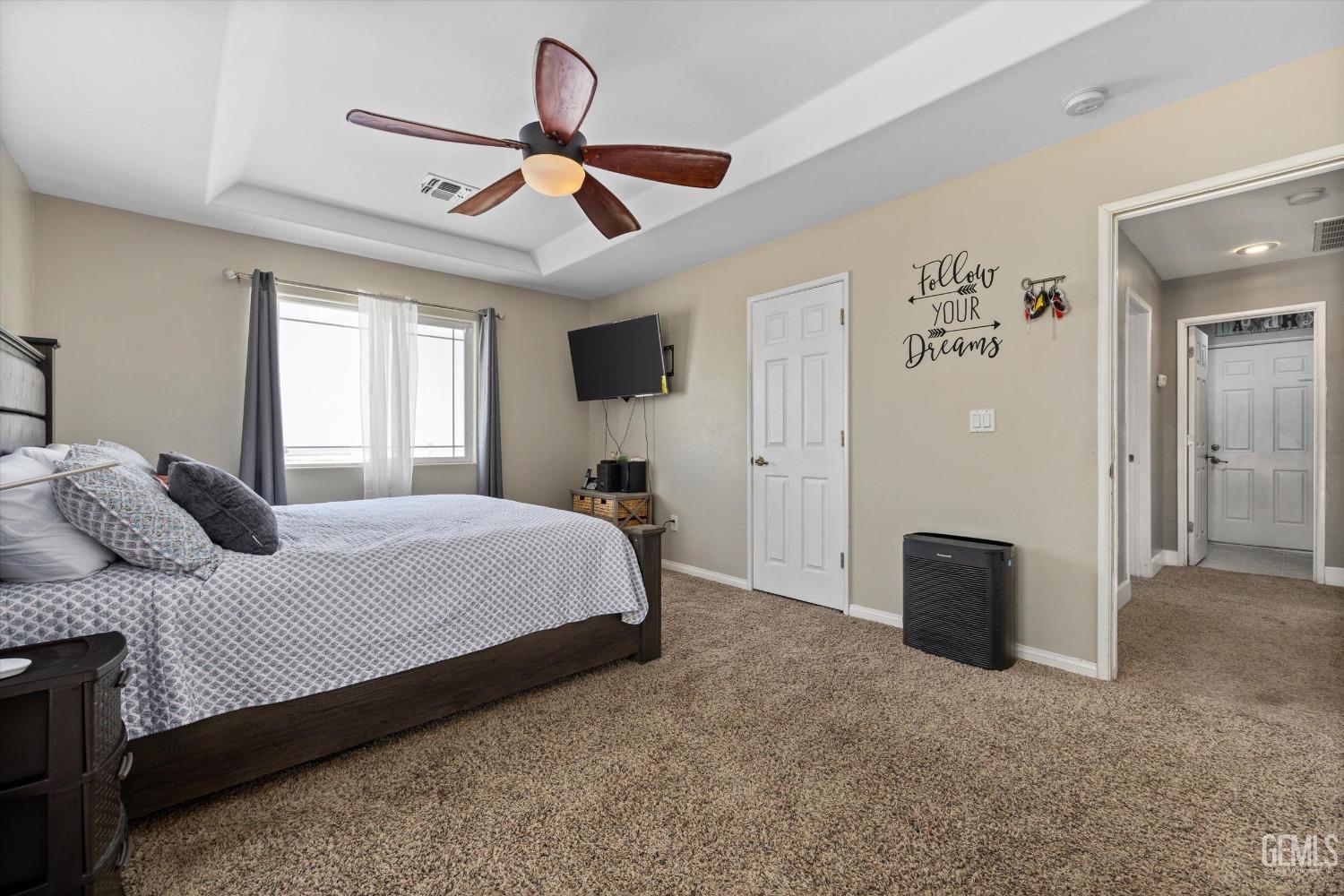 Undisclosed Address Maricopa, CA 93252 - Photo 35 of 47 a bedroom with a bed and ceiling fan