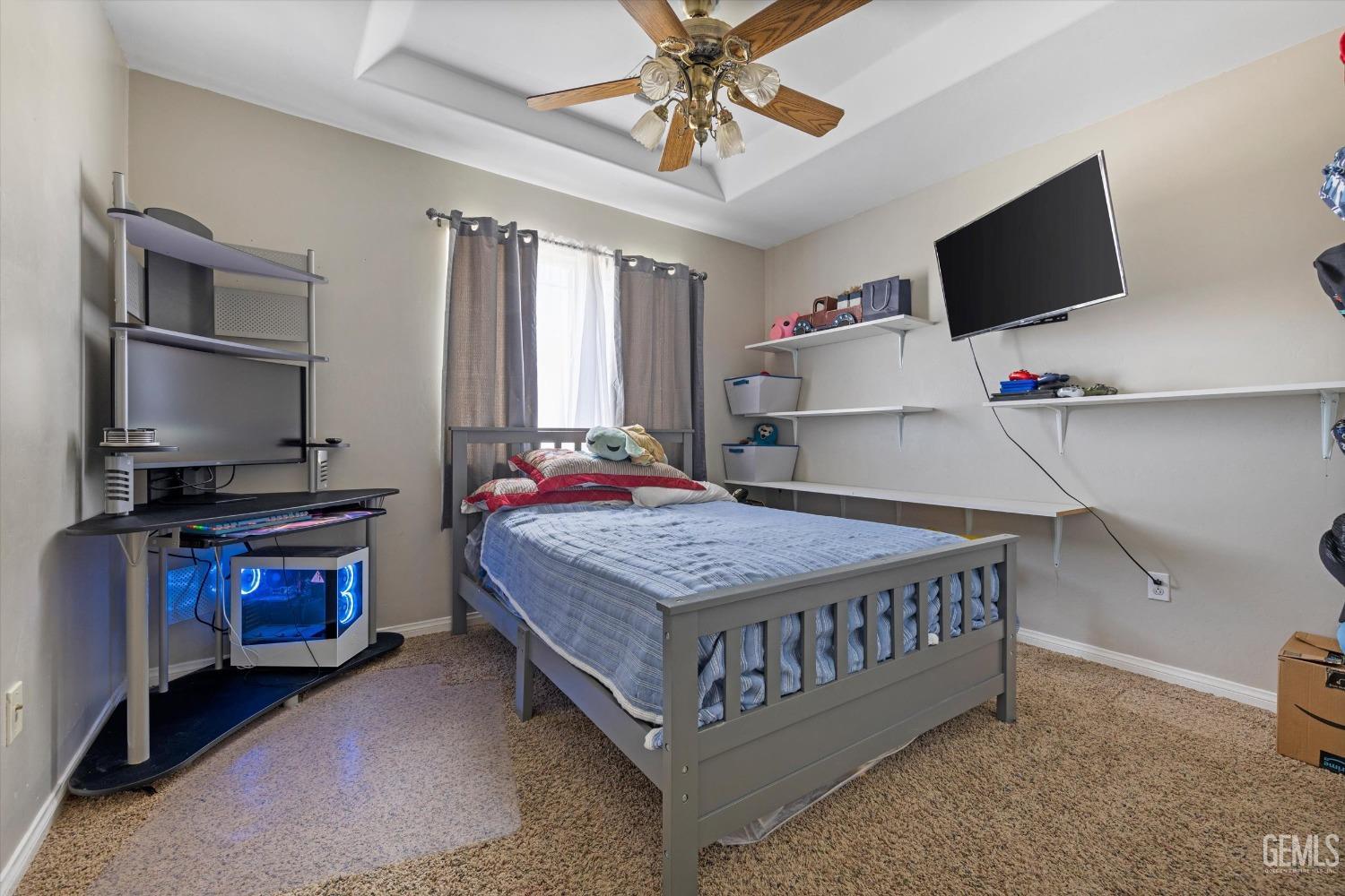 Undisclosed Address Maricopa, CA 93252 - Photo 41 of 47 a living room with furniture and a flat screen tv