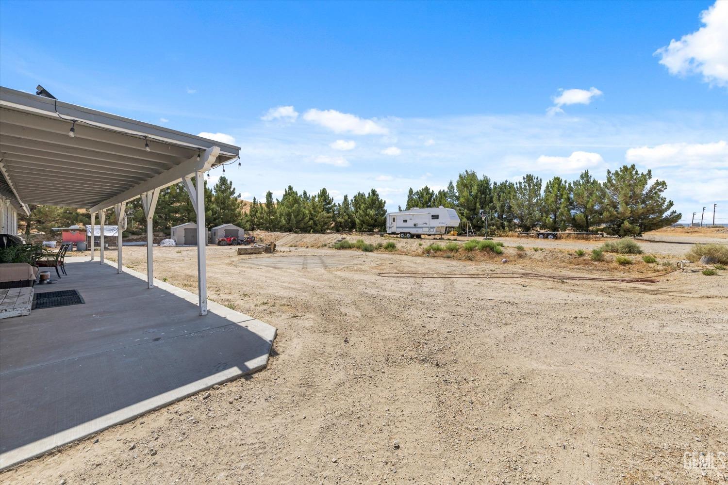 Undisclosed Address Maricopa, CA 93252 - Photo 43 of 47 a view of a backyard of the house