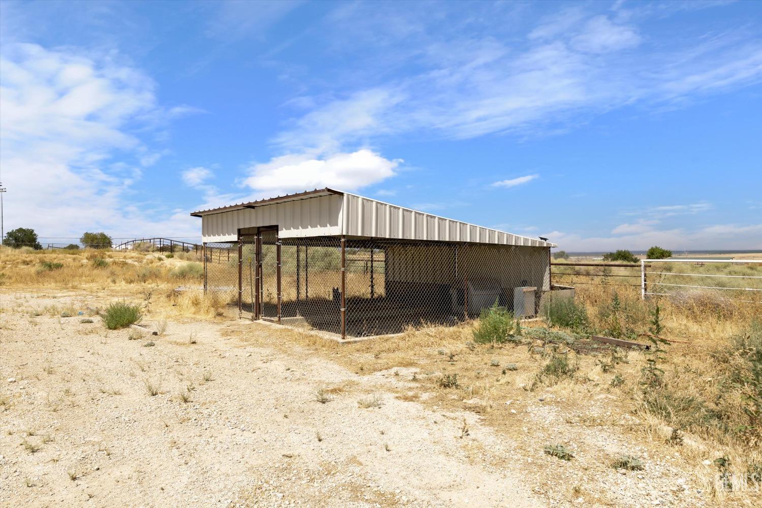 Undisclosed Address Maricopa, CA 93252 - Photo 44 of 47 a view of a lake with a snow in the background