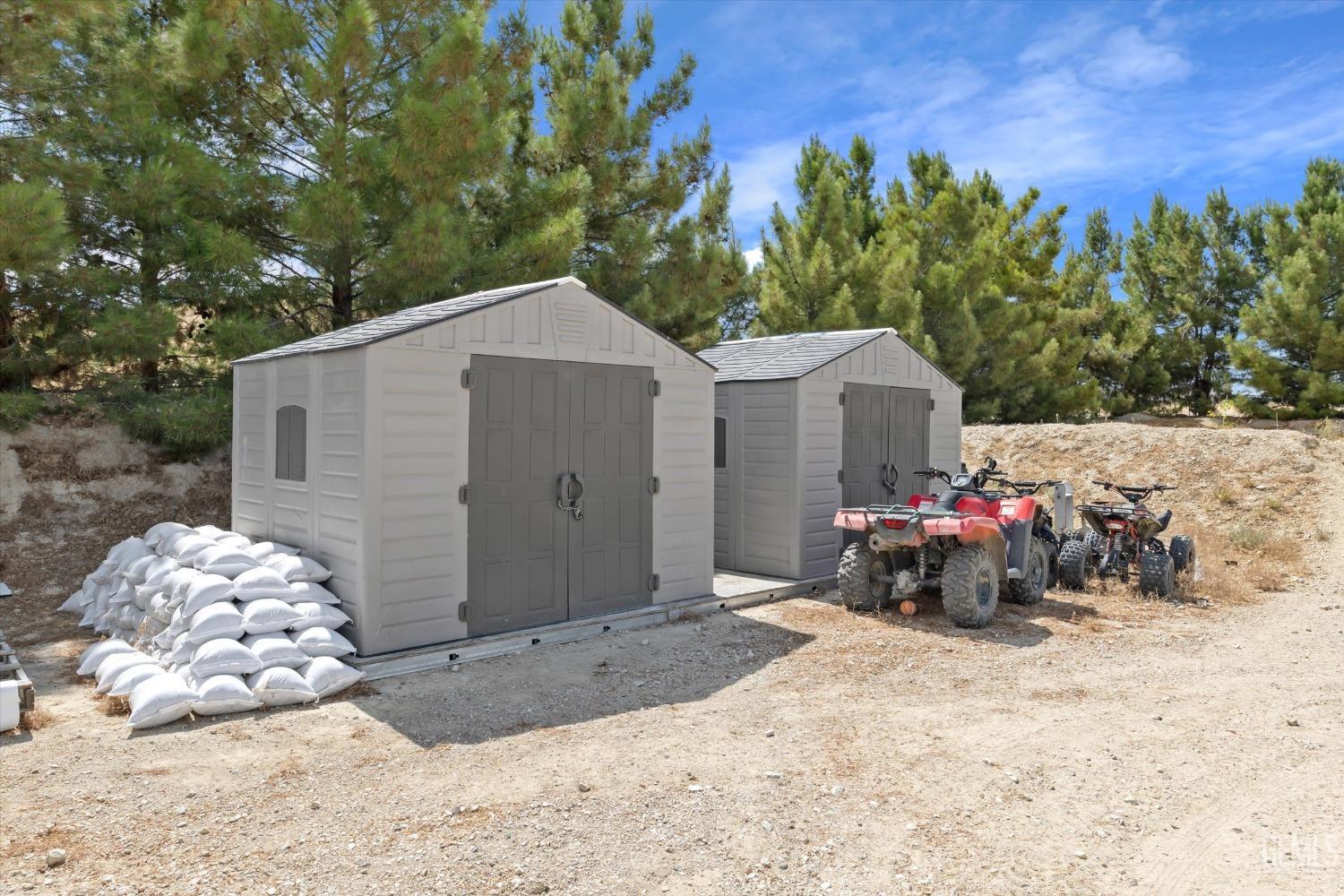 Undisclosed Address Maricopa, CA 93252 - Photo 45 of 47 a view of a house with a snow in the yard