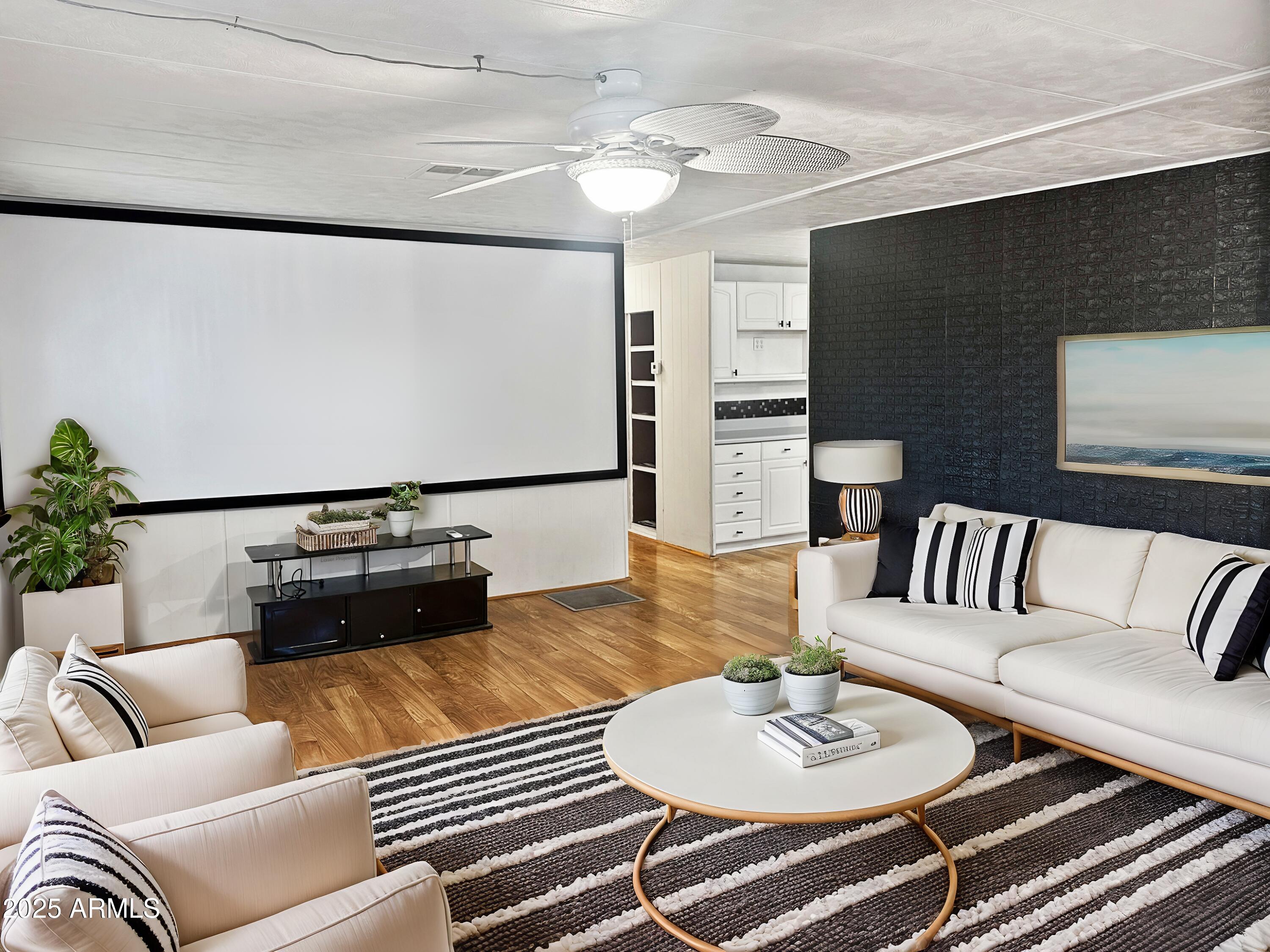 PROJECTOR SCREEN CONVEYS WITH THE HOME