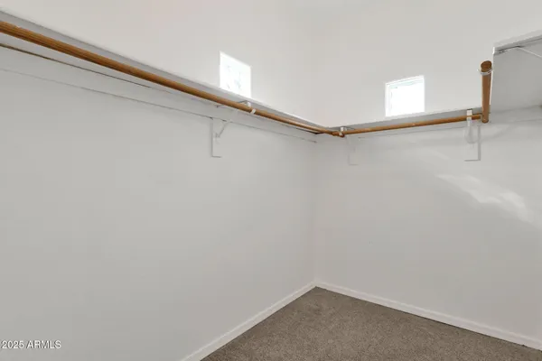 a view of a room with racks on the wall