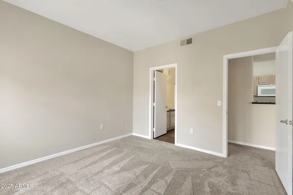 a view of small space with racks on the wall