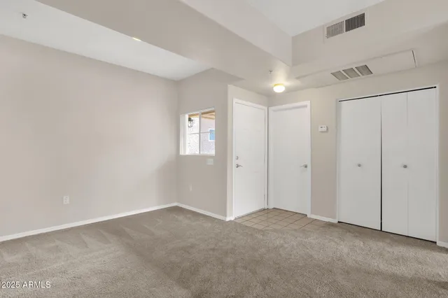 a kitchen with a stove top oven sink and refrigerator