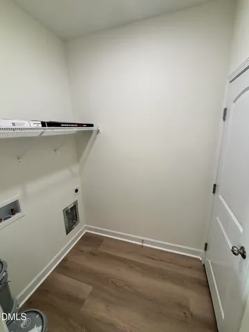 a view of entryway with wooden floor